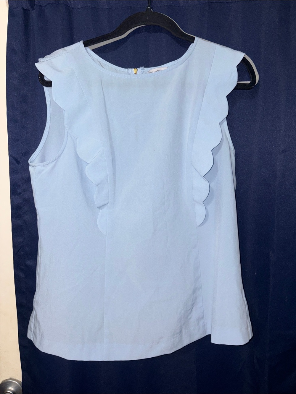 Light Blue Sleeveless Ruffle Front Women’s back zip up blouse